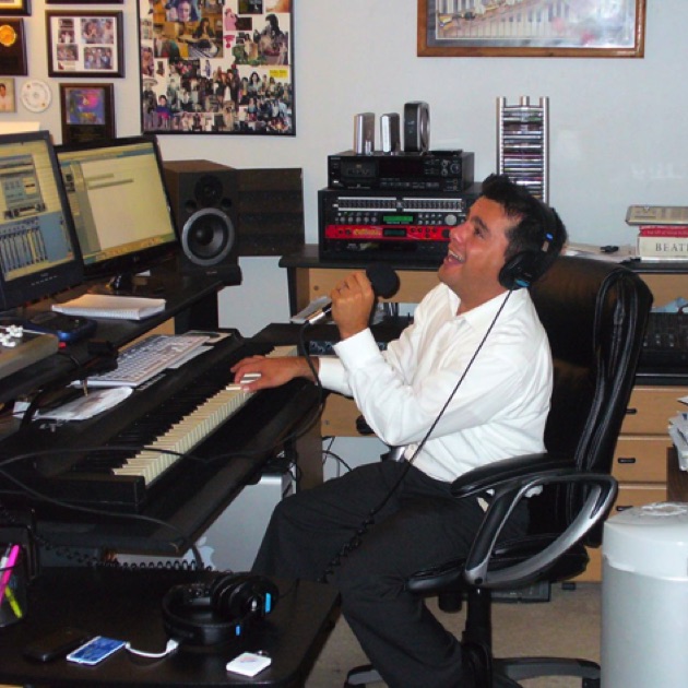 Edgar Vargas practicing a Jingle at Lan Media Productions. Edgar has sung many Jingles produced by Lan Media Productions.